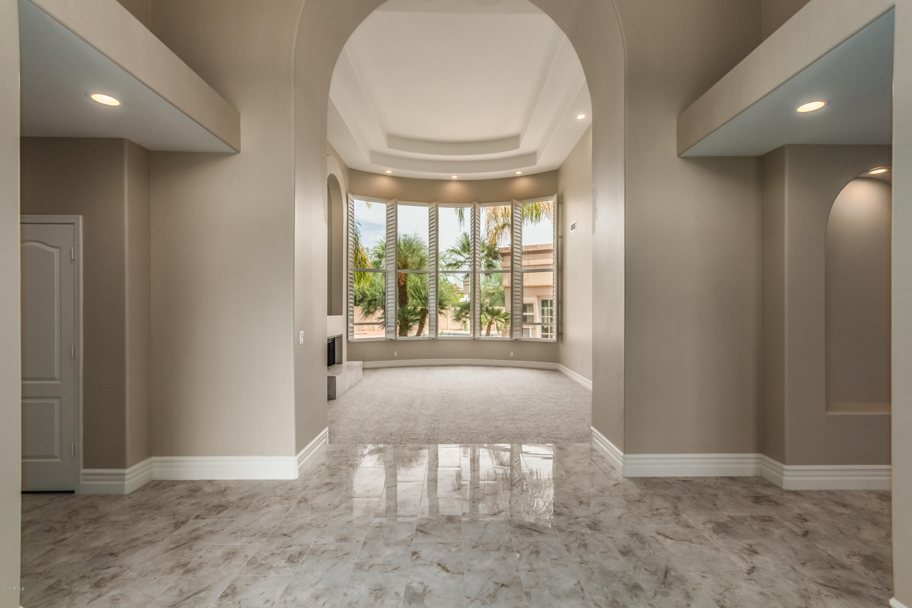 3332 East Cherokee Street Phoenix, AZ 85044 - Photo 4 of 47 a view of livingroom and front door