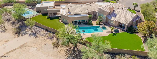 an aerial view of a house with a garden
