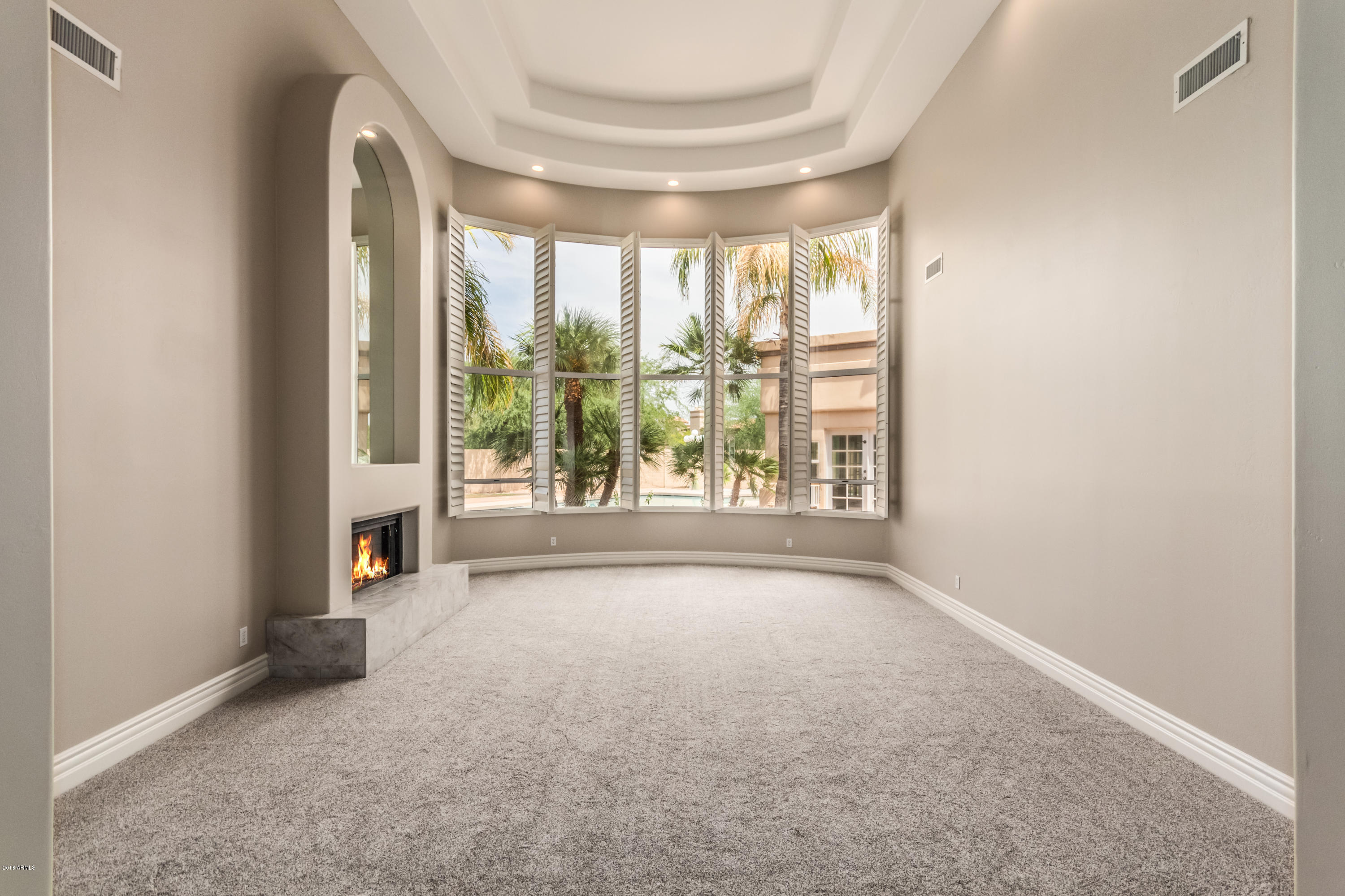 3332 East Cherokee Street Phoenix, AZ 85044 - Photo 5 of 47 an empty room with windows and city view