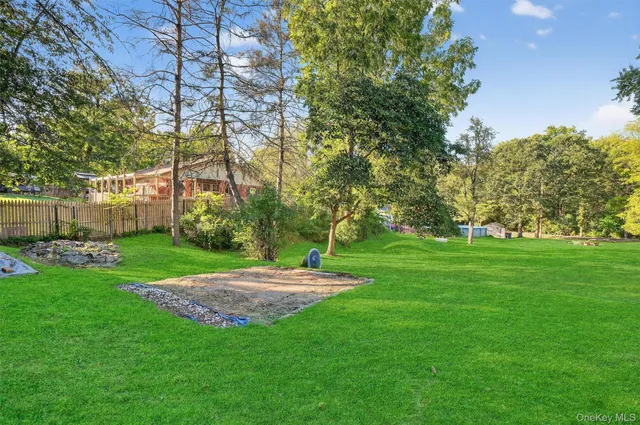 a view of backyard with green space