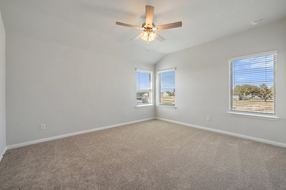 372 Glocken Lane Kyle, TX 78640 - Photo 11 of 37 a view of an empty room with a window