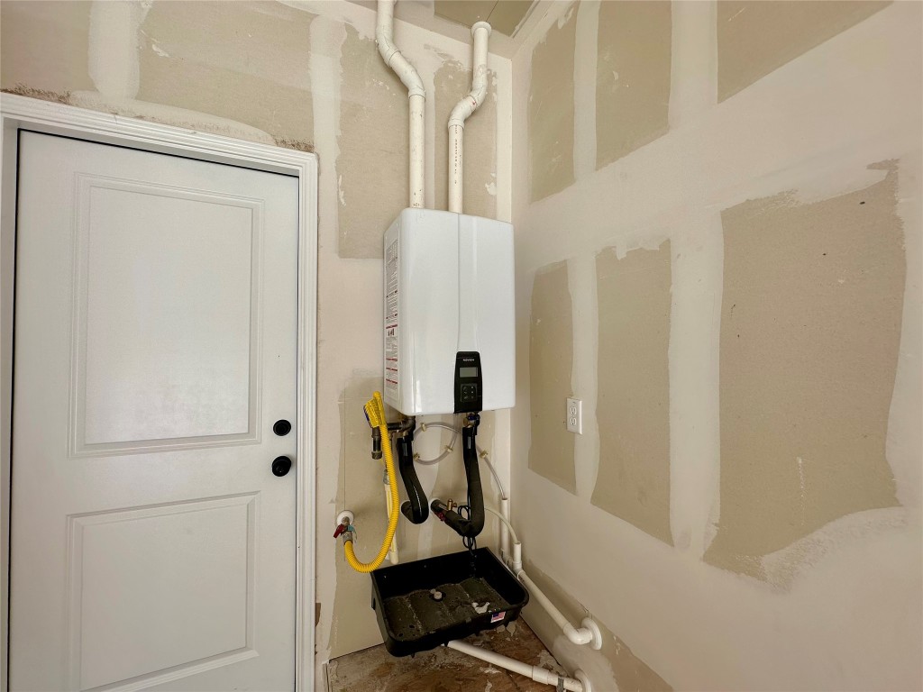 372 Glocken Lane Kyle, TX 78640 - Photo 21 of 37 a view of a room with gym equipment