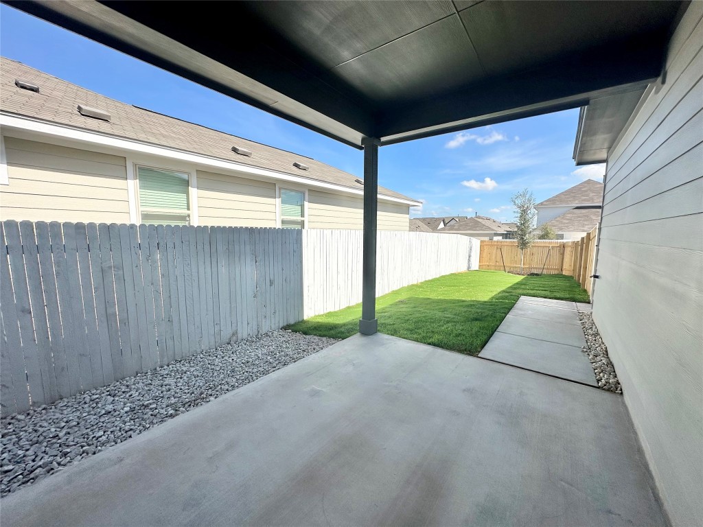 372 Glocken Lane Kyle, TX 78640 - Photo 23 of 37 a view of backyard with porch