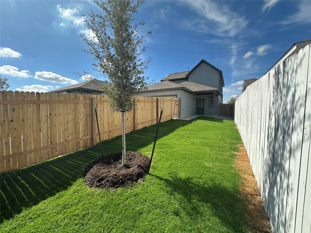 372 Glocken Lane Kyle, TX 78640 - Photo 25 of 37 a view of a back yard of the house