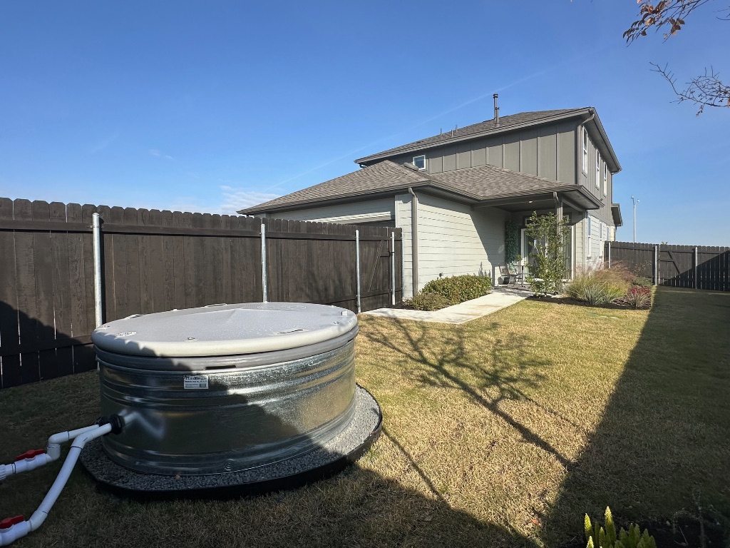 372 Glocken Lane Kyle, TX 78640 - Photo 28 of 37 a view of a house with a wooden fence