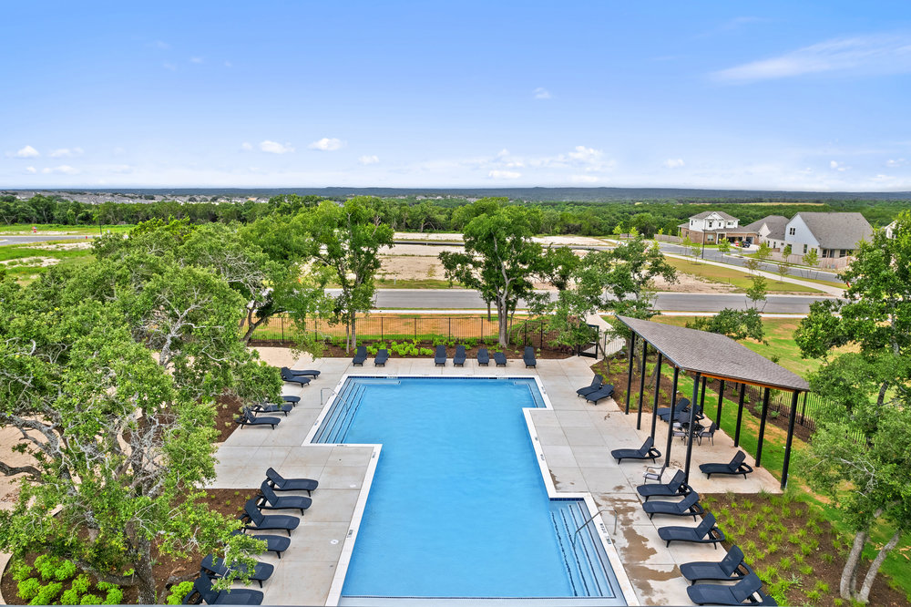 372 Glocken Lane Kyle, TX 78640 - Photo 36 of 37 a view of a city with lawn chairs next to a yard
