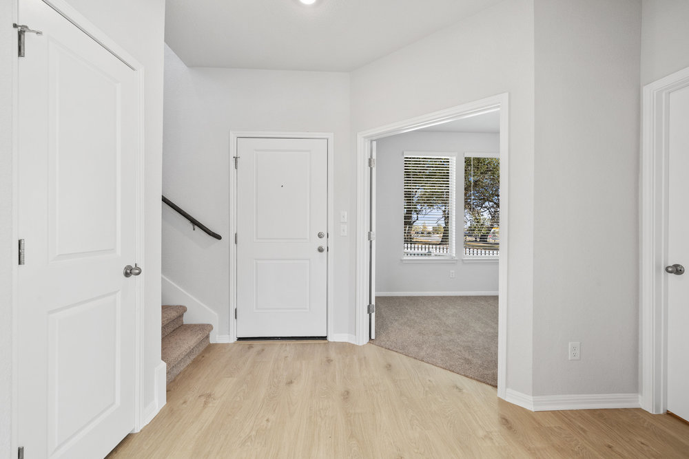 372 Glocken Lane Kyle, TX 78640 - Photo 4 of 37 an empty room with windows