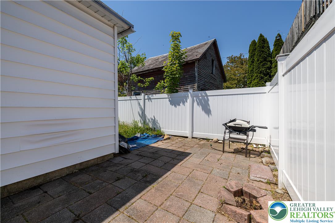118 South 3rd Street Bangor, PA 18013 - Photo 26 of 33 Enjoy outdoor moments on this private patio with durable pavers and a sturdy fence.