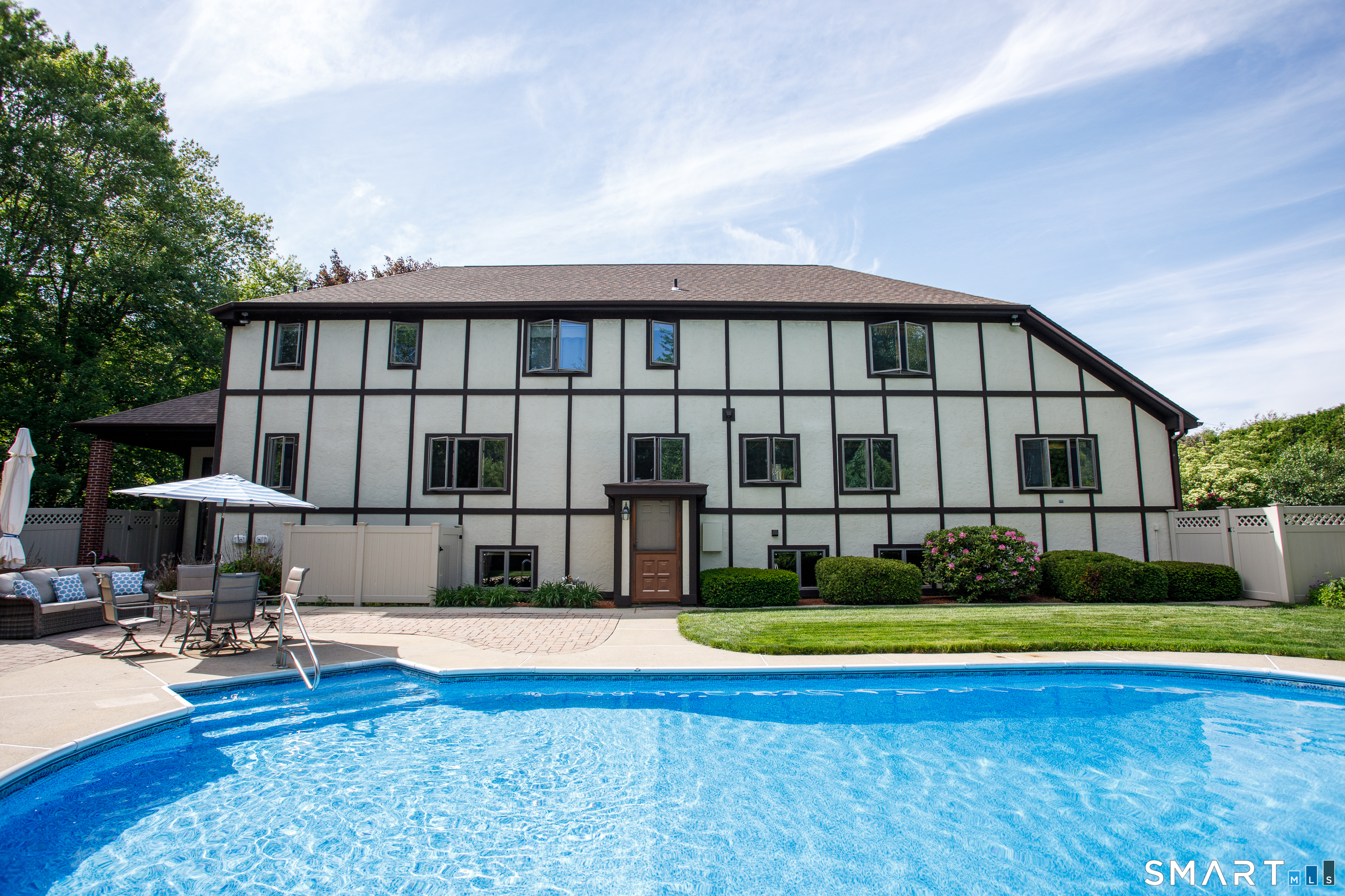 25 Stony Ridge Road Norwich, CT 06360 - Photo 35 of 40 a view of swimming pool with lawn chairs and plants