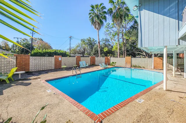 swimming pool with outdoor seating