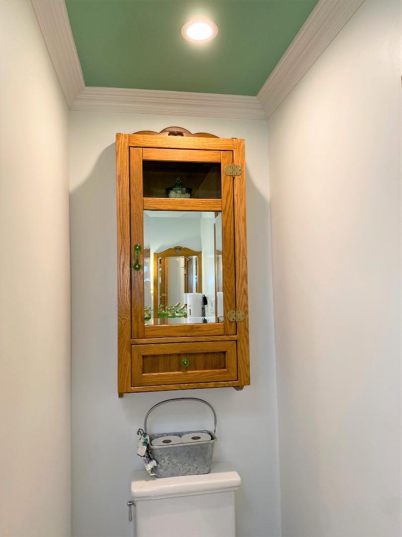 621 McClellan Avenue, Unit STUDIO Monterey, CA 93940 - Photo 24 of 32 a bathroom with a sink and a mirror