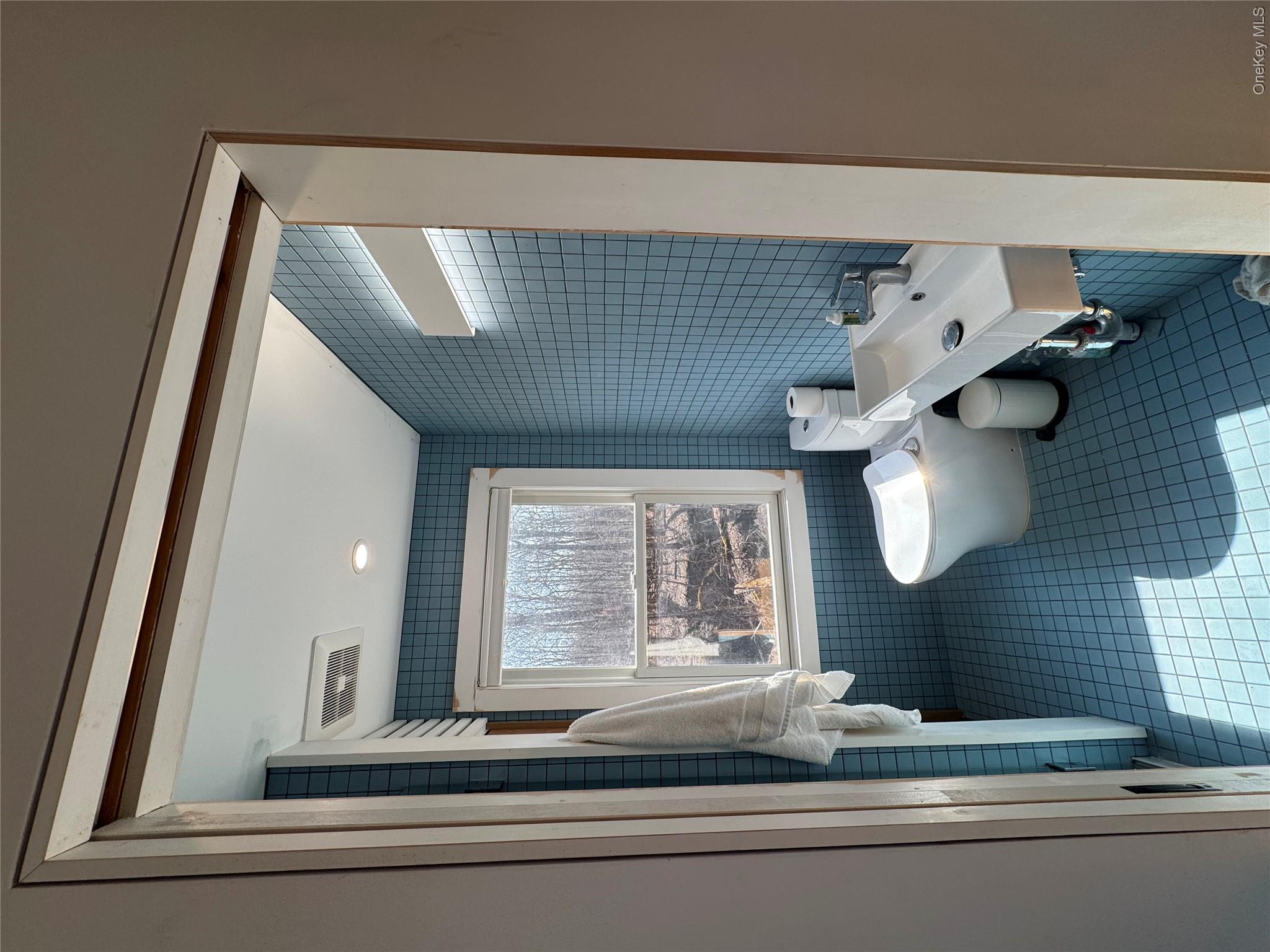 40 Pioneer Road Gardiner, NY 12525 - Photo 14 of 16 a bathroom with a sink and a mirror
