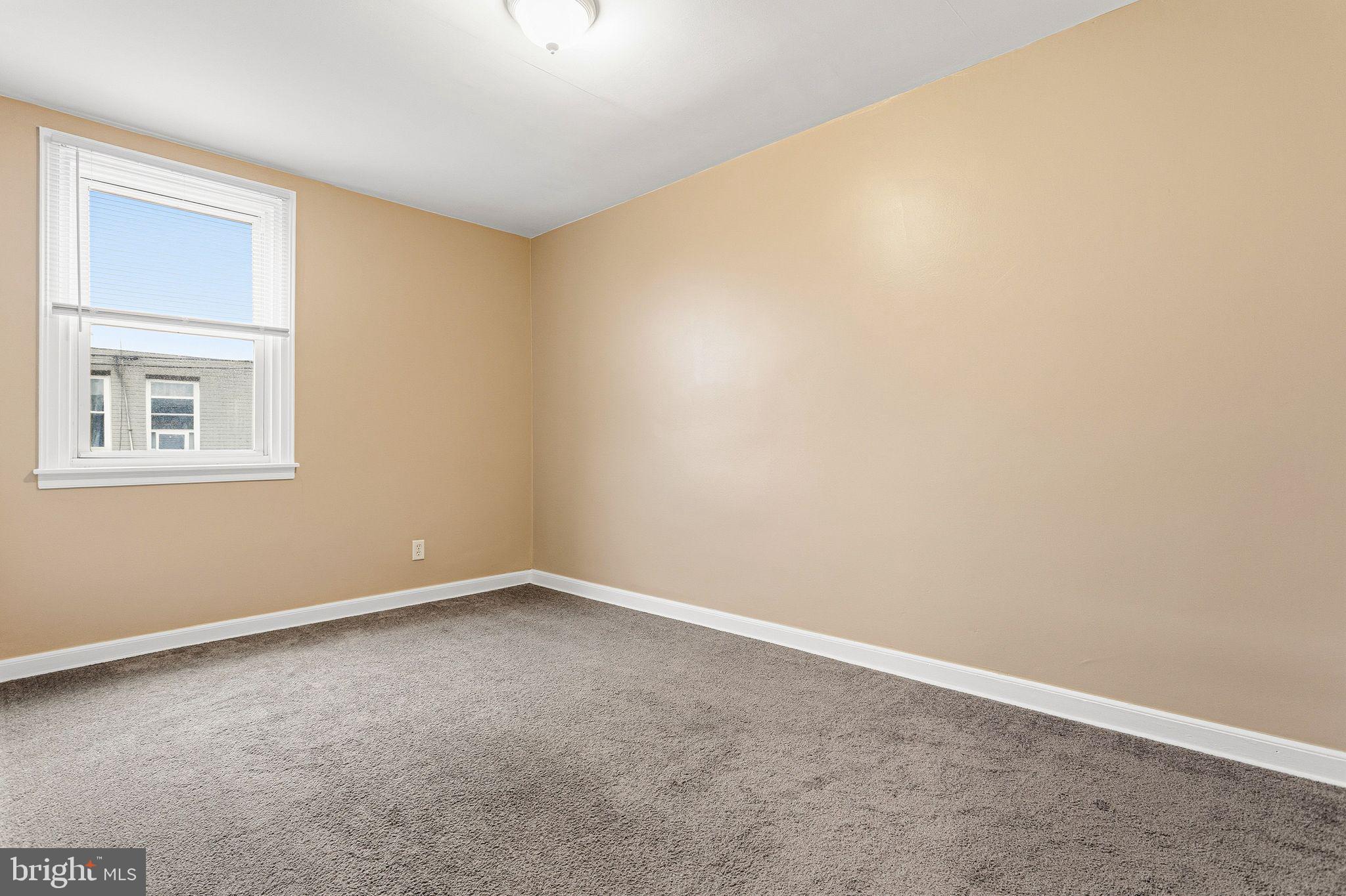 4528 Tudor Street Philadelphia, PA 19136 - Photo 12 of 21 an empty room with a window