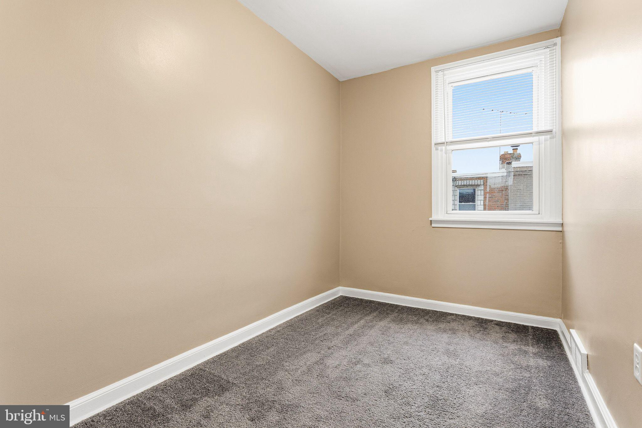 4528 Tudor Street Philadelphia, PA 19136 - Photo 14 of 21 an empty room with a window