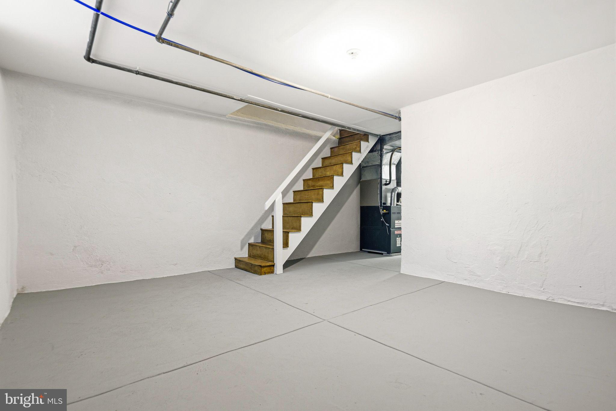 4528 Tudor Street Philadelphia, PA 19136 - Photo 17 of 21 a view of an empty room with stairs