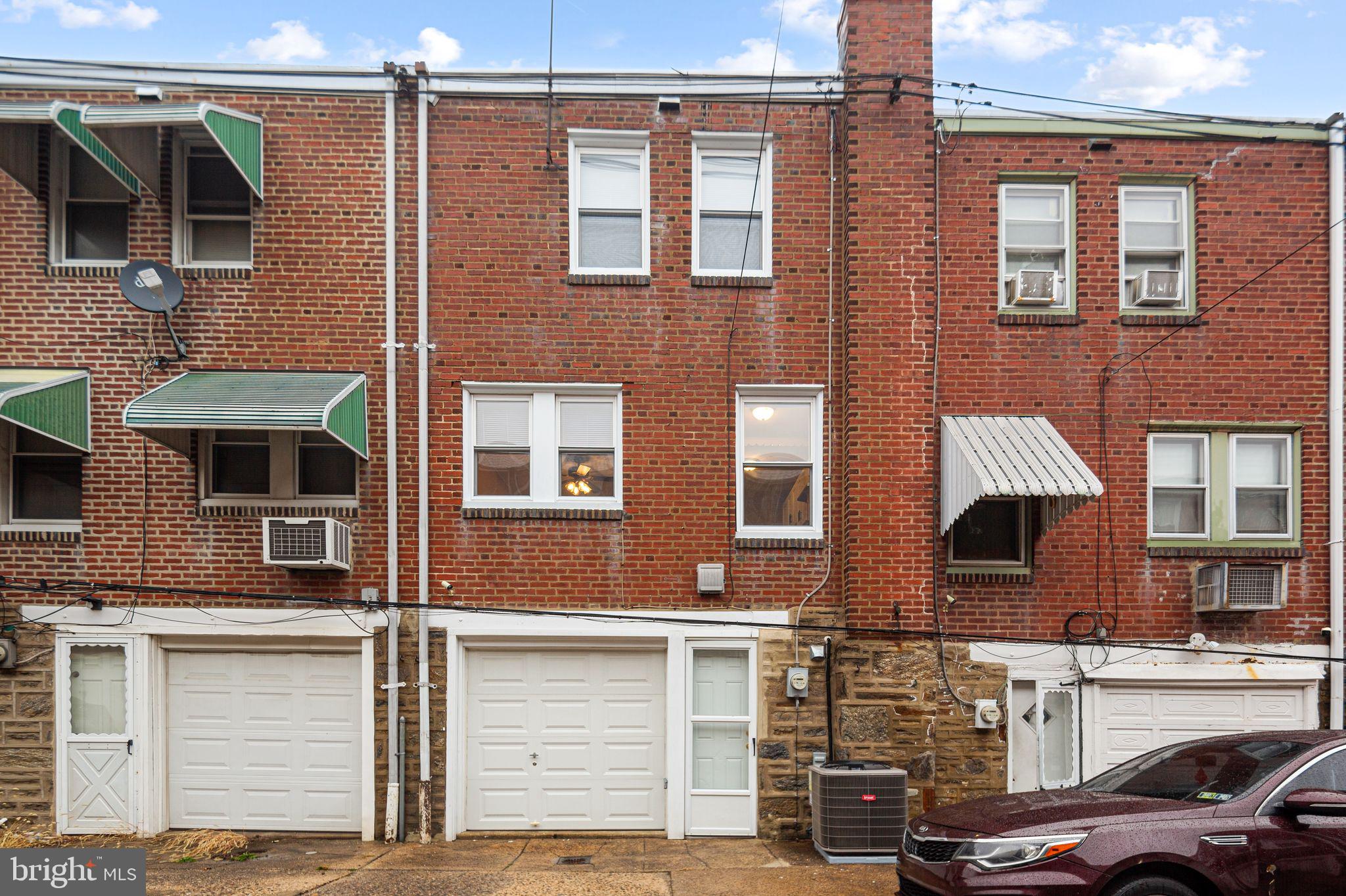 4528 Tudor Street Philadelphia, PA 19136 - Photo 21 of 21 a front view of a building with parking space