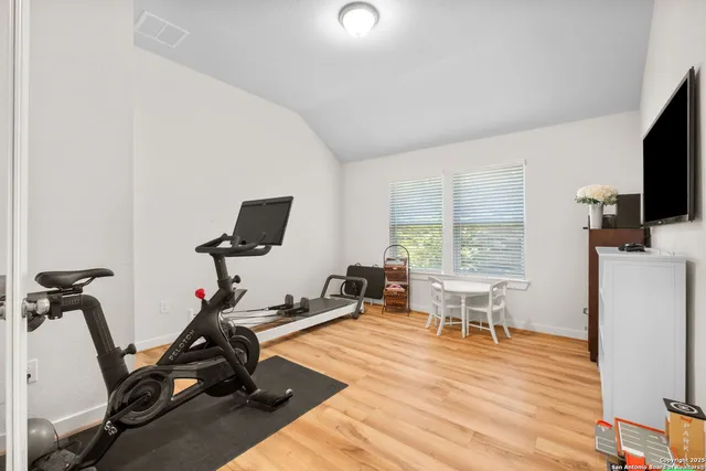 a view of a room with gym equipment