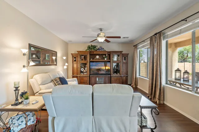 a kitchen with granite countertop a sink stainless steel appliances and cabinets