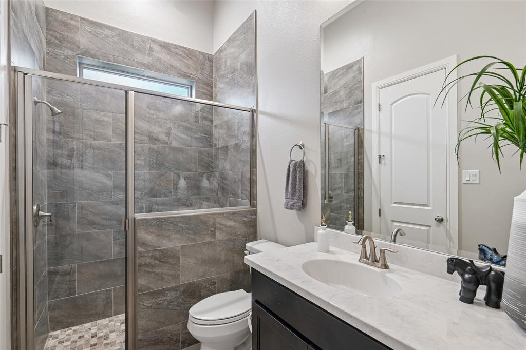 1657 Florence Road Keller, TX 76262 - Photo 22 of 40 a bathroom with a sink toilet and shower