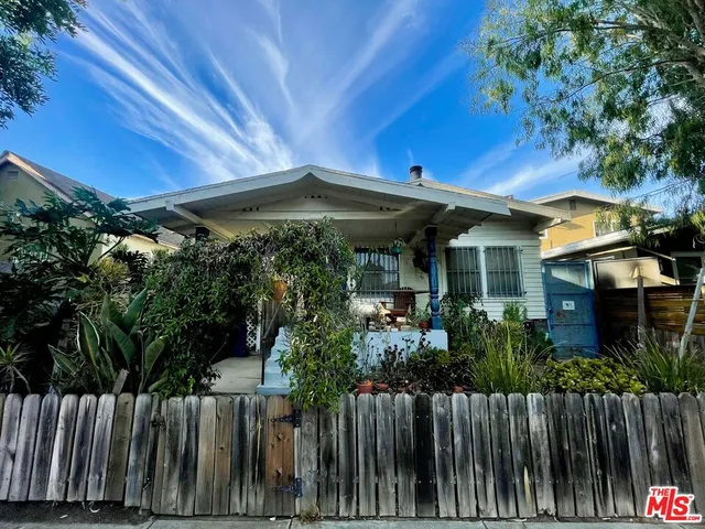 a view of a backyard with plants