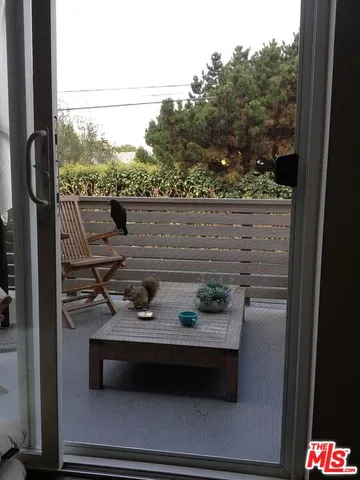 a view of a terrace with sitting area