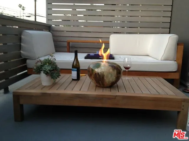 a toilet sitting in a bathroom next to a road