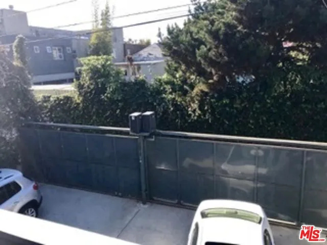 a city street filled with lots of traffic and cars