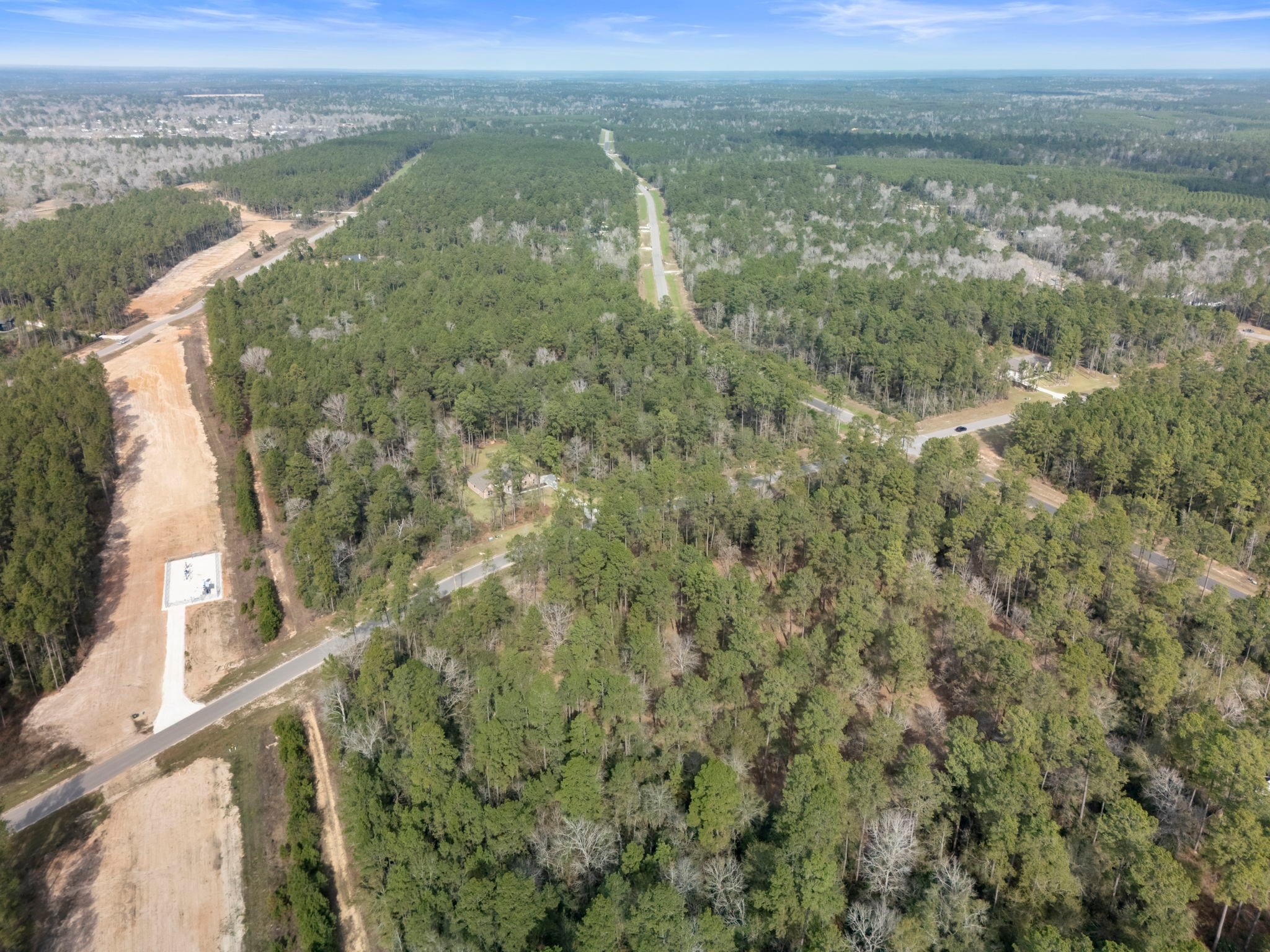 15880 Four Hls Road Willis, TX 77378 - Photo 13 of 25 a view of a city with an ocean