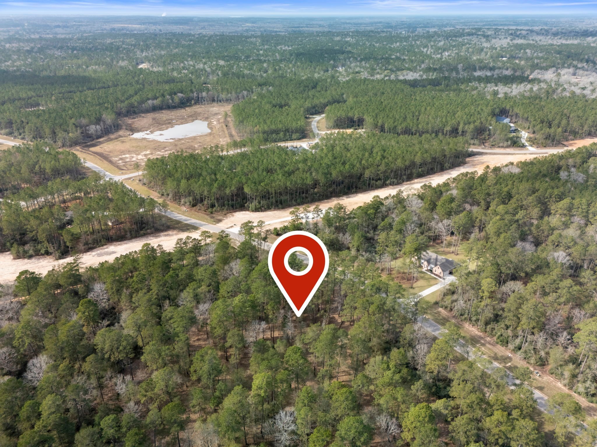 15880 Four Hls Road Willis, TX 77378 - Photo 15 of 25 an aerial view of a golf course with parking space