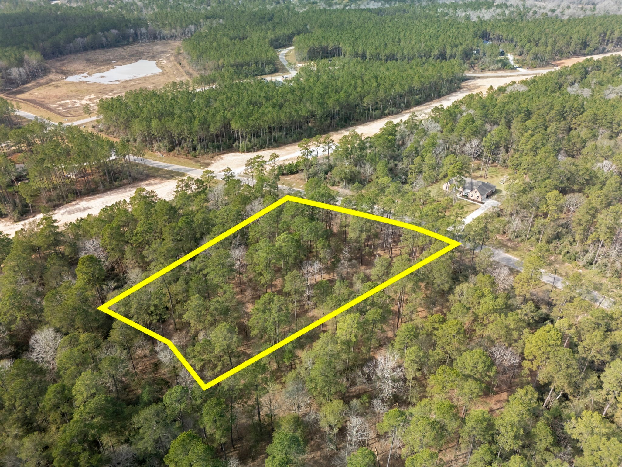 15880 Four Hls Road Willis, TX 77378 - Photo 17 of 25 a view of a tennis court