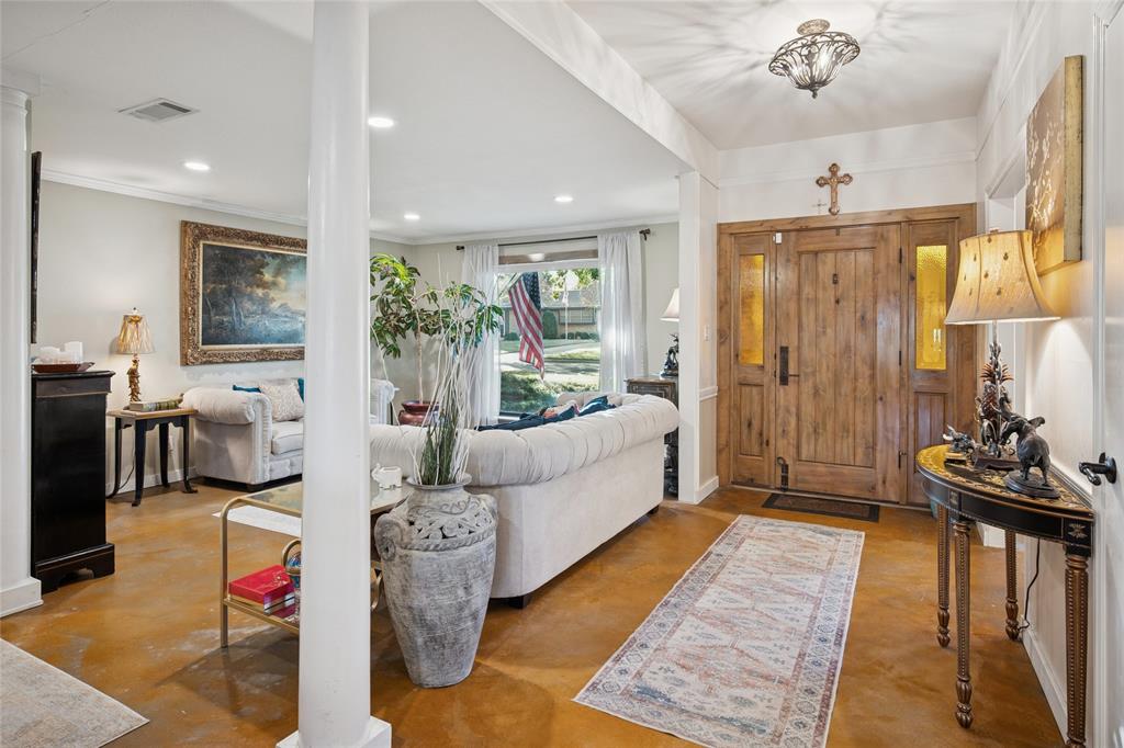 3701 Streamwood Road Fort Worth, TX 76116 - Photo 4 of 34 a living room with furniture and a chandelier