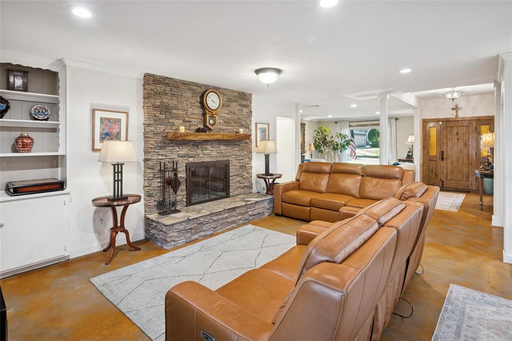 3701 Streamwood Road Fort Worth, TX 76116 - Photo 8 of 34 a living room with furniture and a fireplace