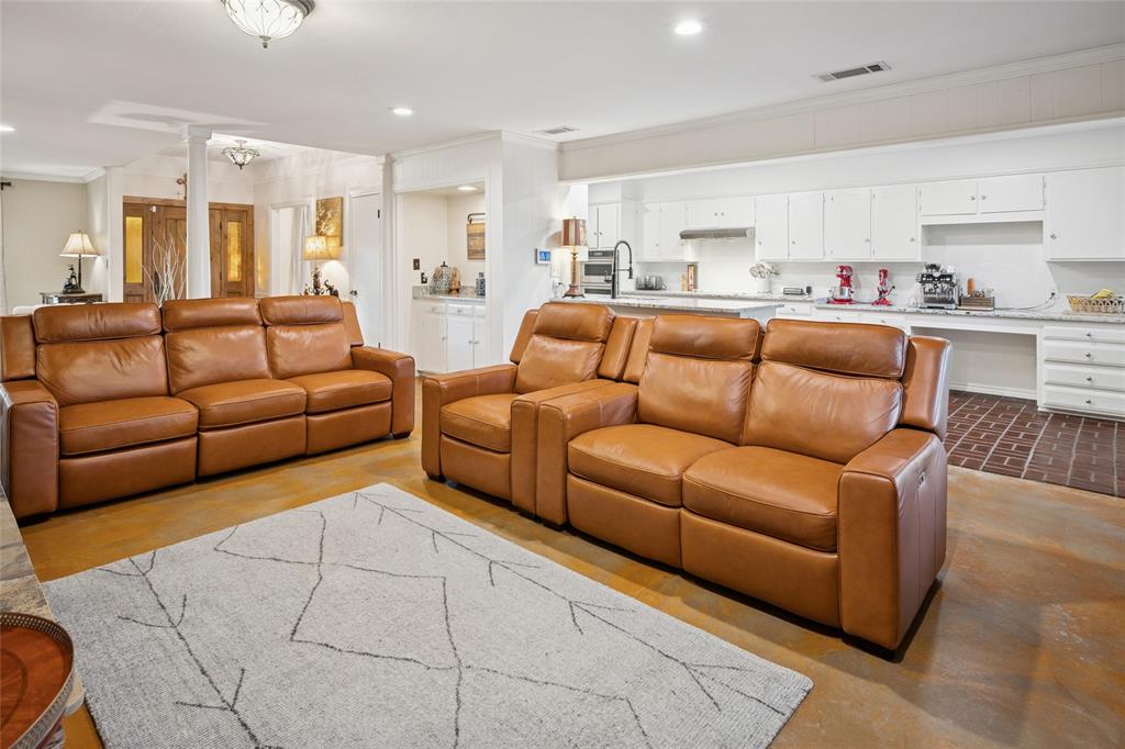 3701 Streamwood Road Fort Worth, TX 76116 - Photo 10 of 34 a living room with furniture and kitchen view