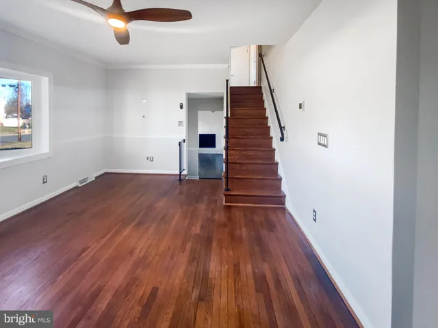 wooden floor in a hall with an entryway