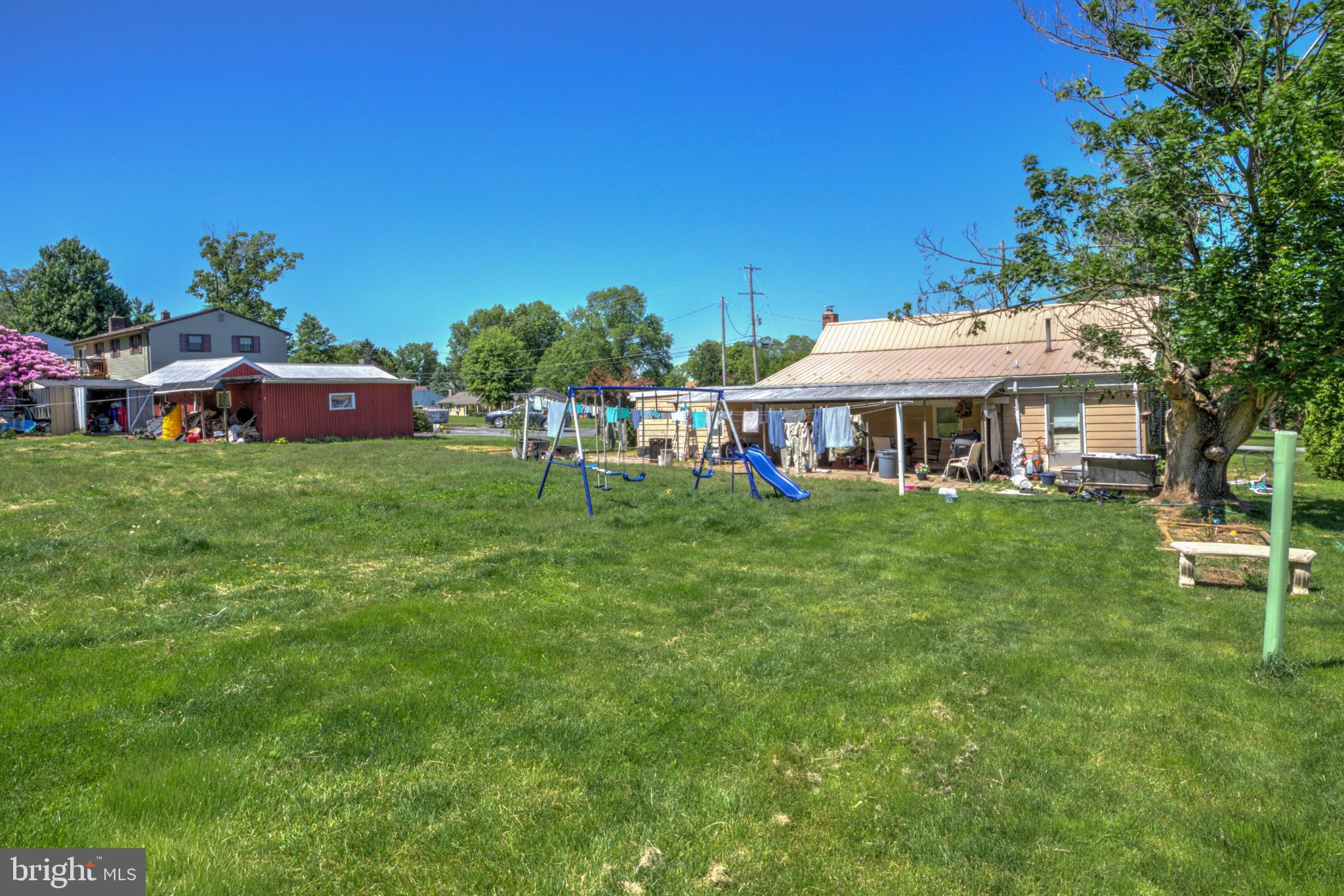 3472 Messersmith Road York, PA 17408 - Photo 11 of 41 Spacious yard with play area bliss.