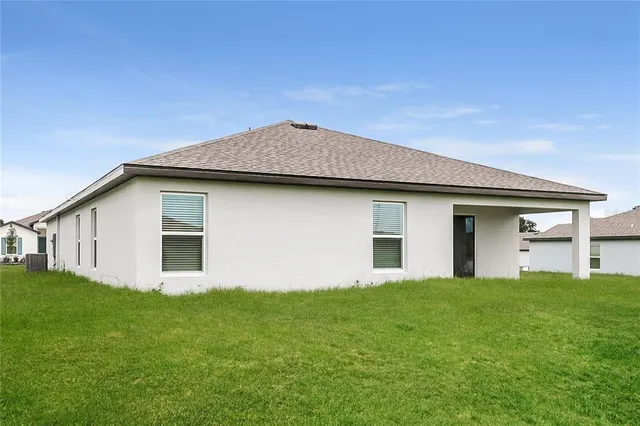 a picture of a bench in a white wall