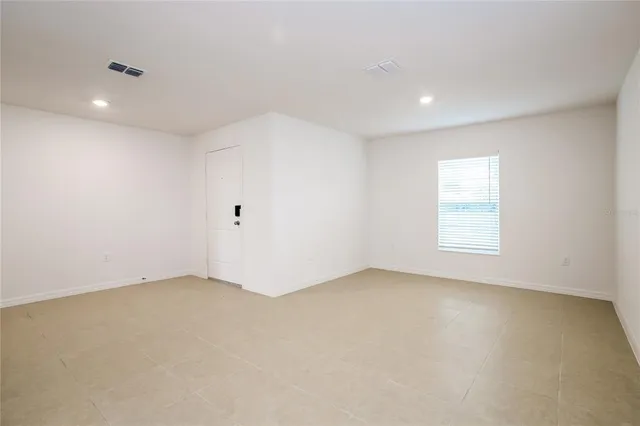 an empty room with a window