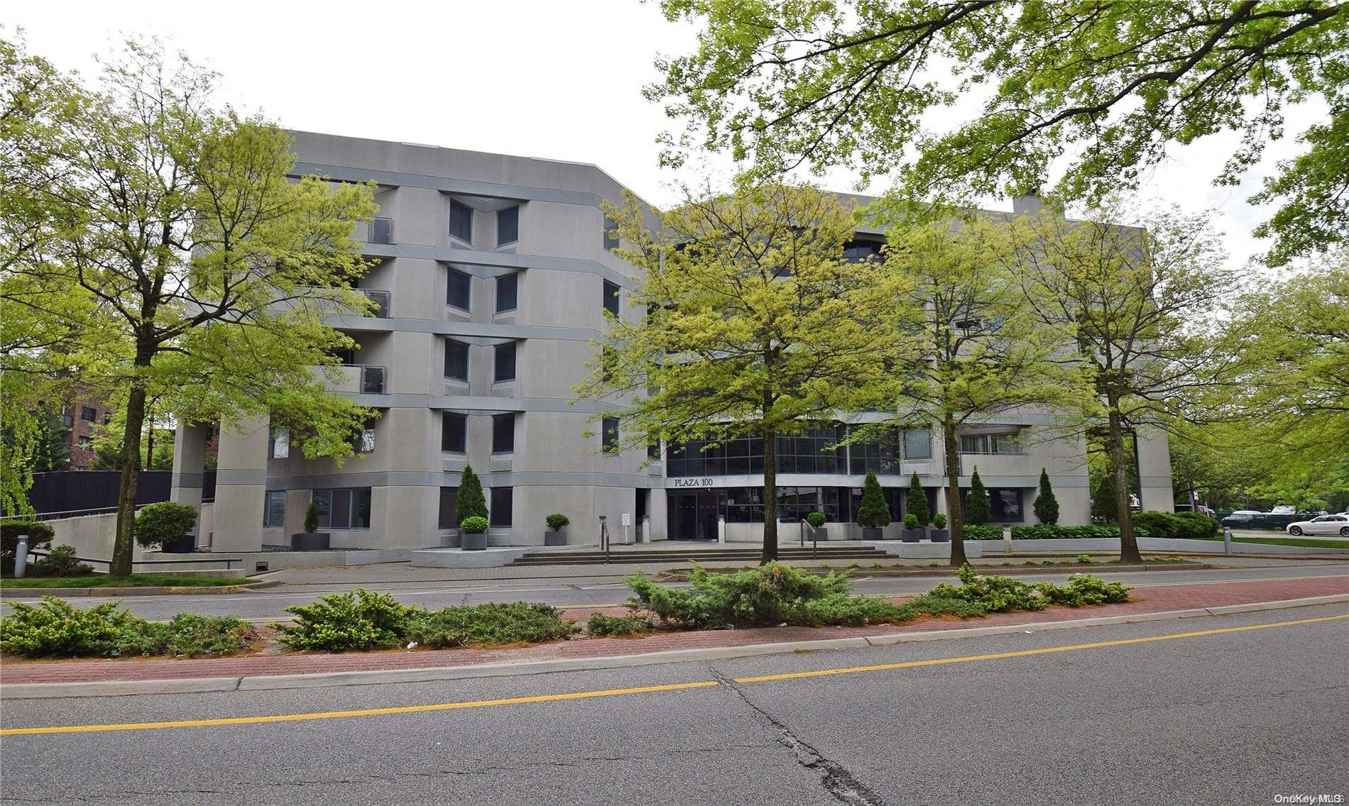 100 Great Neck Road, Unit 2B Great Neck, NY 11021 - Photo 1 of 1 a view of a building with a street