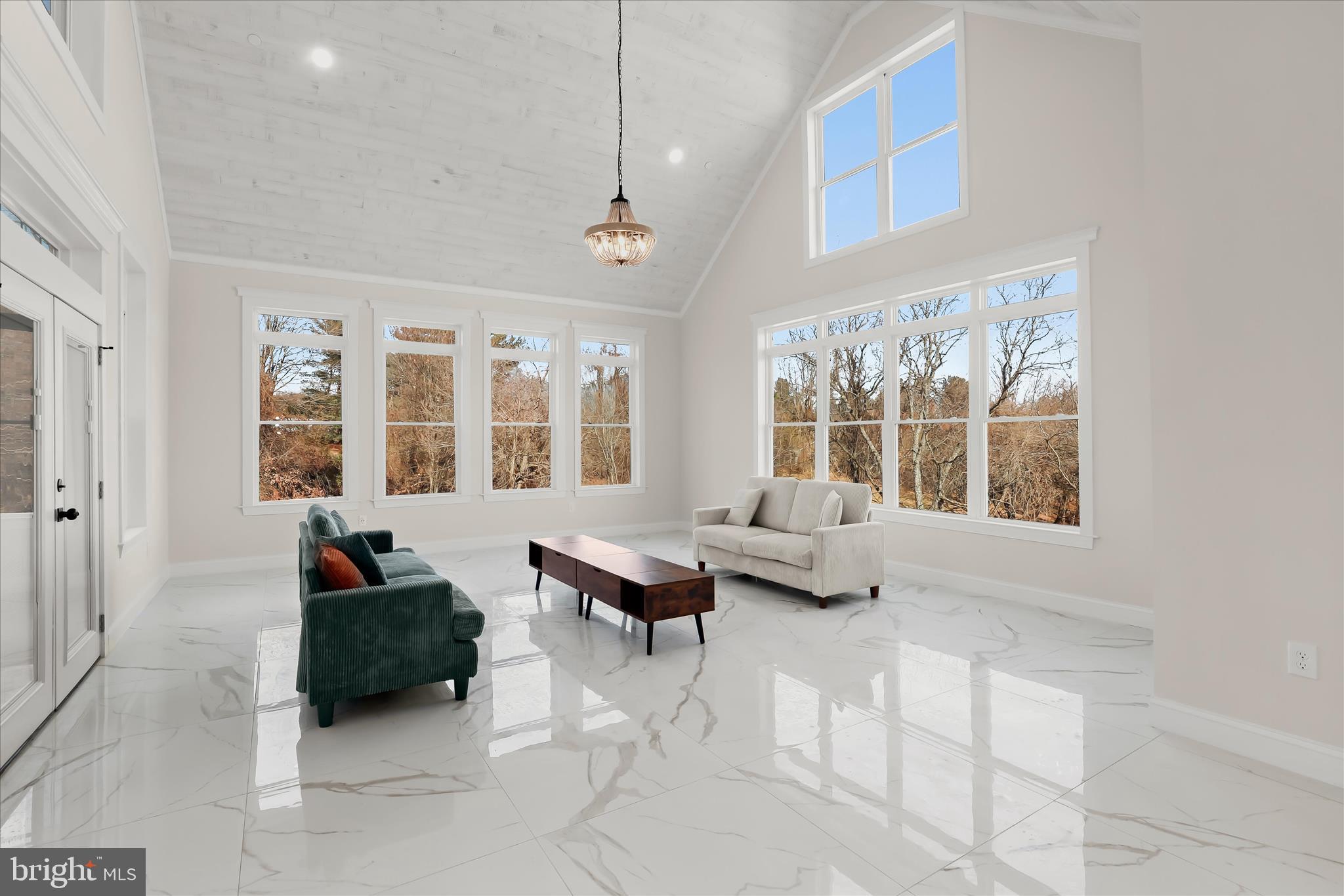 5004 Ten Oaks Road Dayton, MD 21036 - Photo 22 of 99 a living room with furniture and large windows