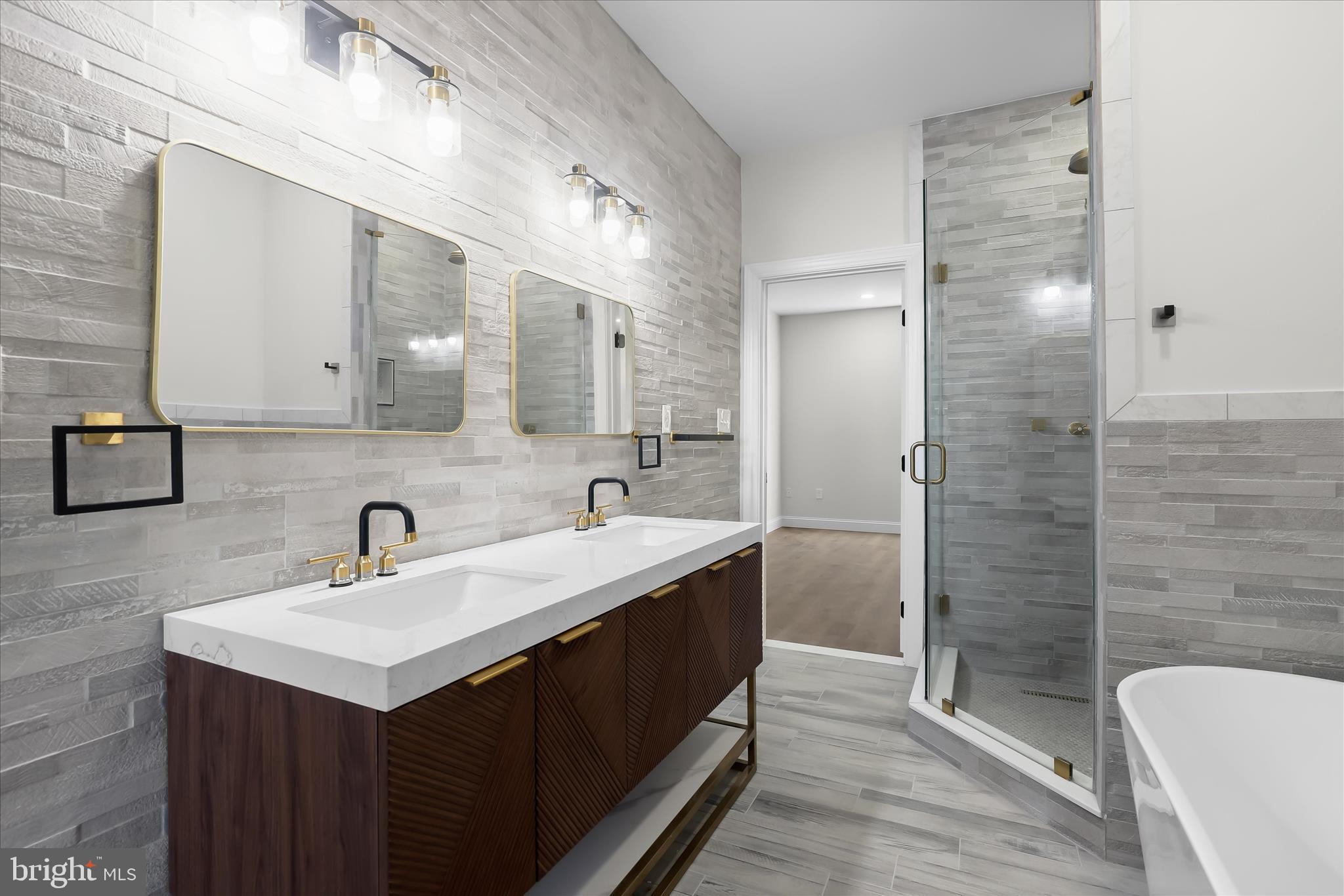 5004 Ten Oaks Road Dayton, MD 21036 - Photo 63 of 99 a bathroom with a sink and a mirror