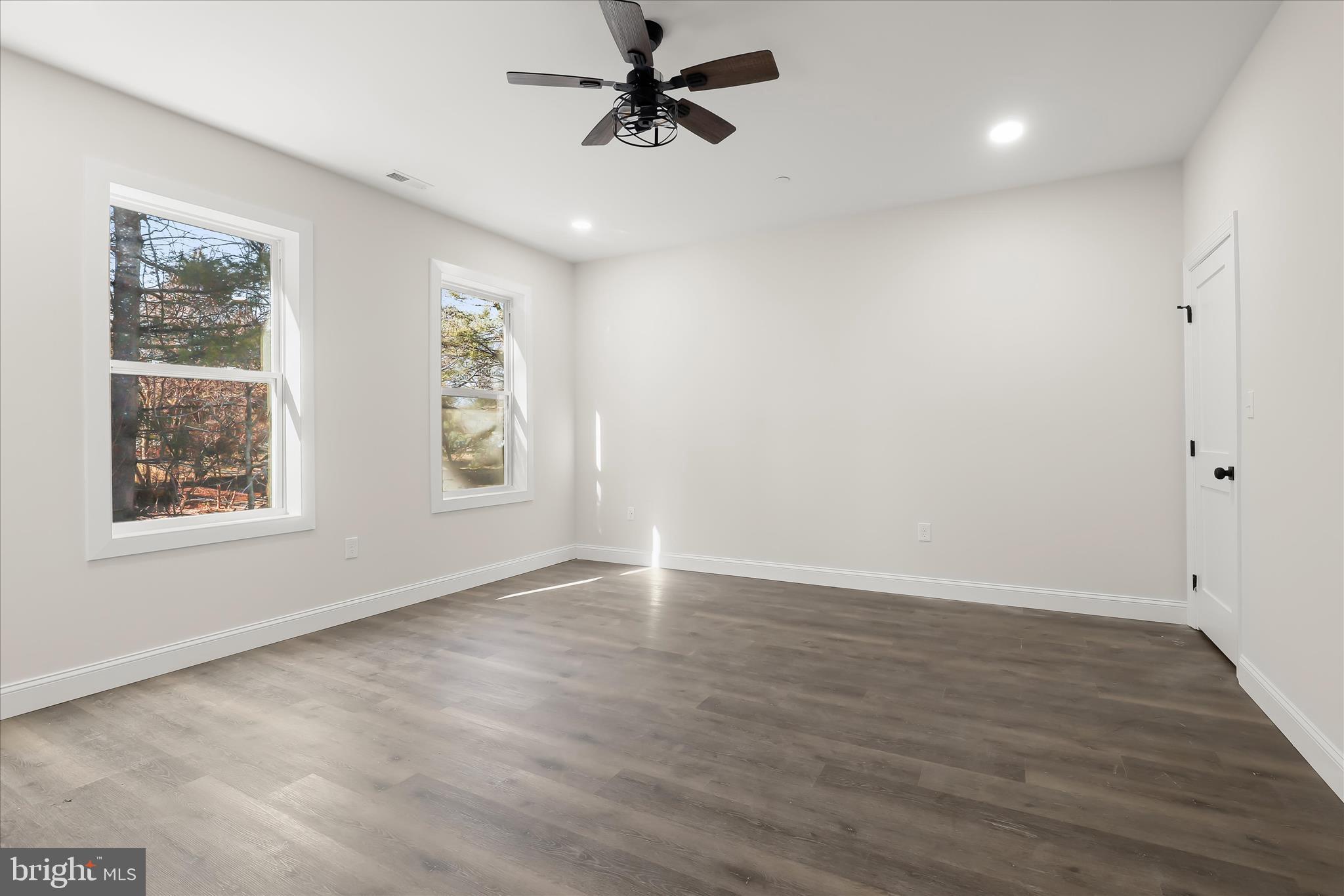 5004 Ten Oaks Road Dayton, MD 21036 - Photo 65 of 99 wooden floor in an empty room with a window