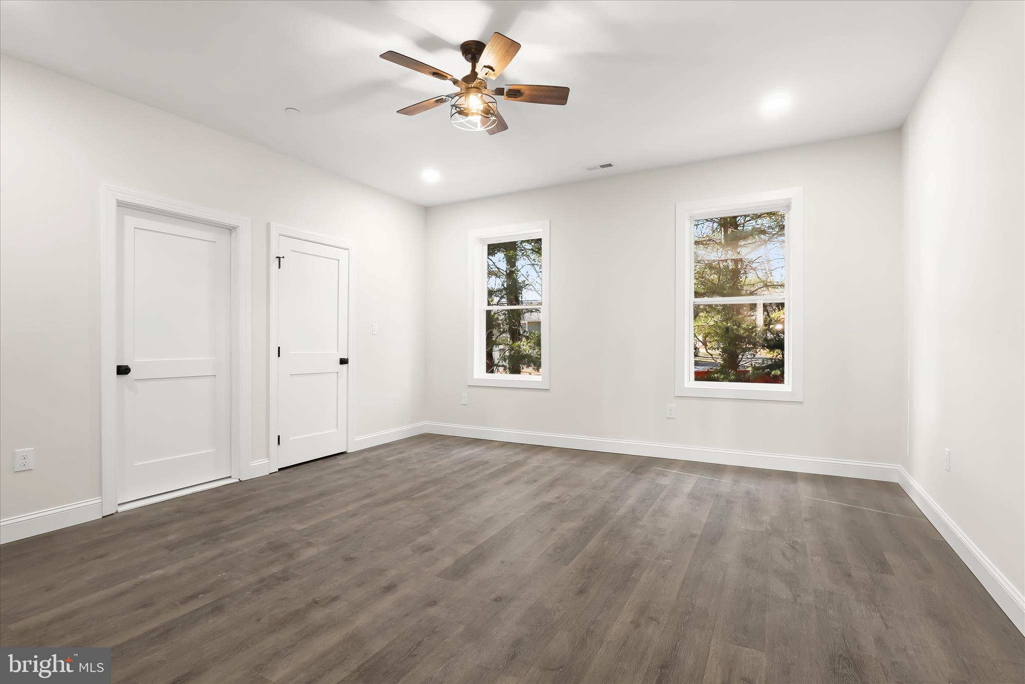 5004 Ten Oaks Road Dayton, MD 21036 - Photo 66 of 99 wooden floor in an empty room with a window
