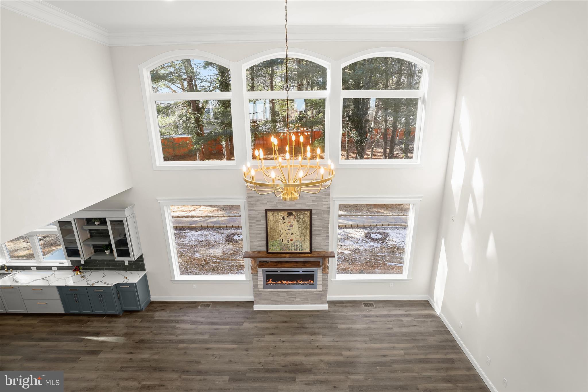 5004 Ten Oaks Road Dayton, MD 21036 - Photo 75 of 99 a view of a living room with furniture flat screen tv and kitchen view
