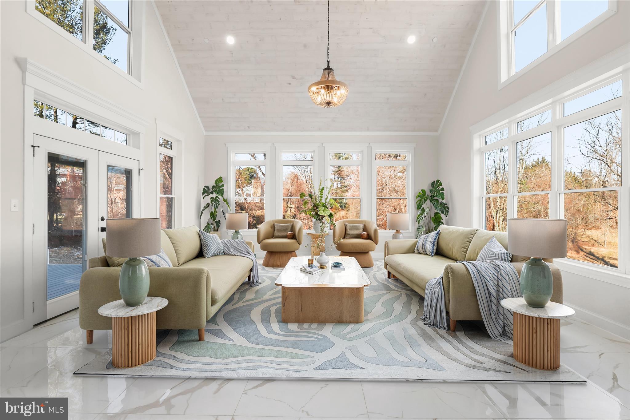 5004 Ten Oaks Road Dayton, MD 21036 - Photo 10 of 99 a living room with furniture a large window and a table