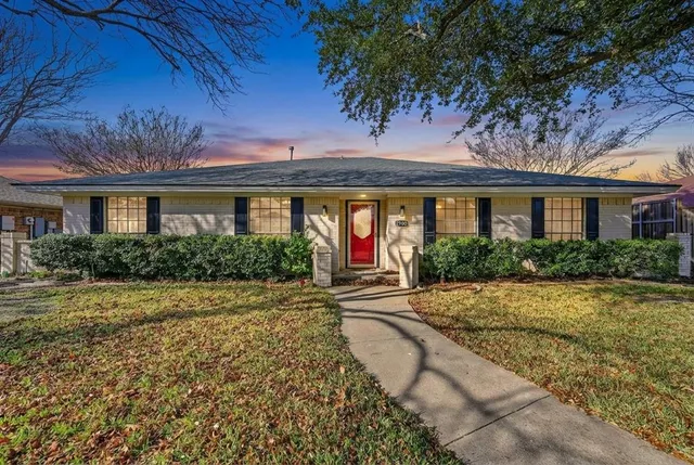 front view of house with a yard