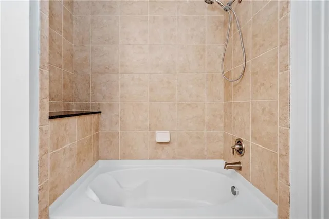 a bathroom with a bathtub