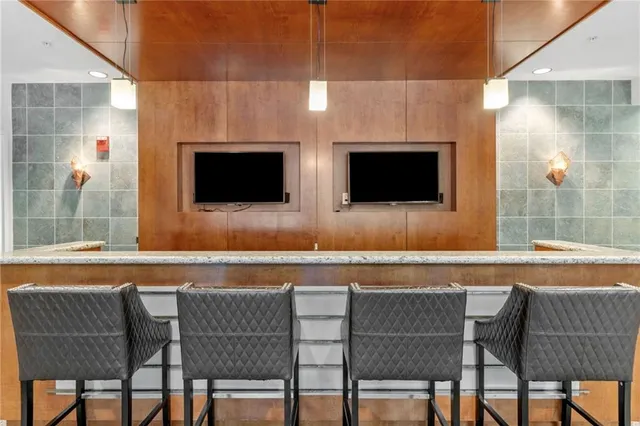 a kitchen with sink cabinets and window
