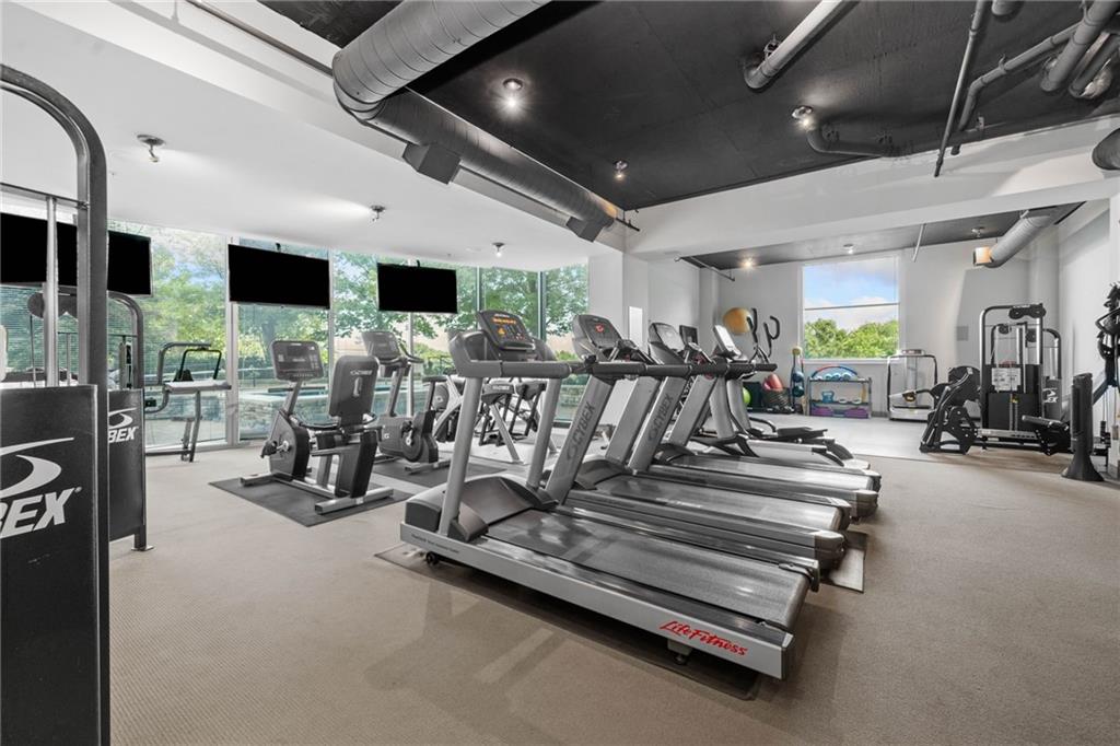 3300 Windy Ridge Parkway Southeast, Unit 1113 Atlanta, GA 30339 - Photo 34 of 39 a view of a room with gym equipment