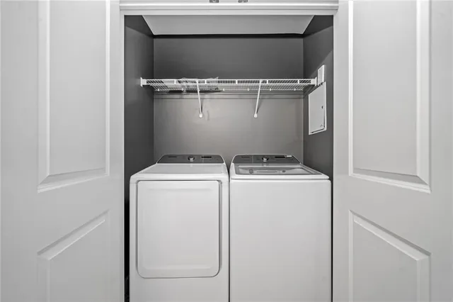 a utility room with dryer and washer