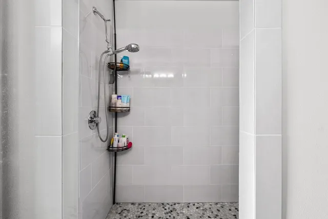 a bedroom with a bed and a table in it